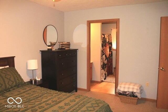 7 Gladiator Dr, Waynetown, IN 47990 - carpeted bedroom with a walk in closet and baseboards