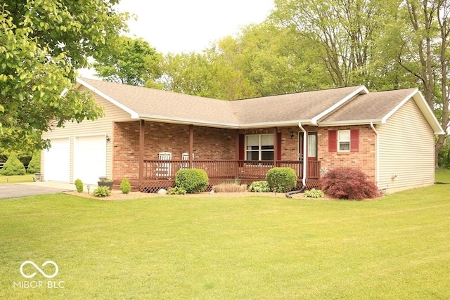 7 Gladiator Dr, Waynetown, IN 47990 - ranch-style house with covered porch, brick siding, a front yard, a garage, and driveway