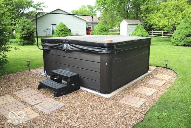 7 Gladiator Dr, Waynetown, IN 47990 - view of yard with a hot tub, a storage shed, and an outbuilding