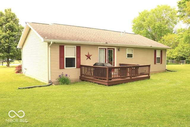 7 Gladiator Dr, Waynetown, IN 47990 - rear view of property with a deck, a yard, and a shingled roof