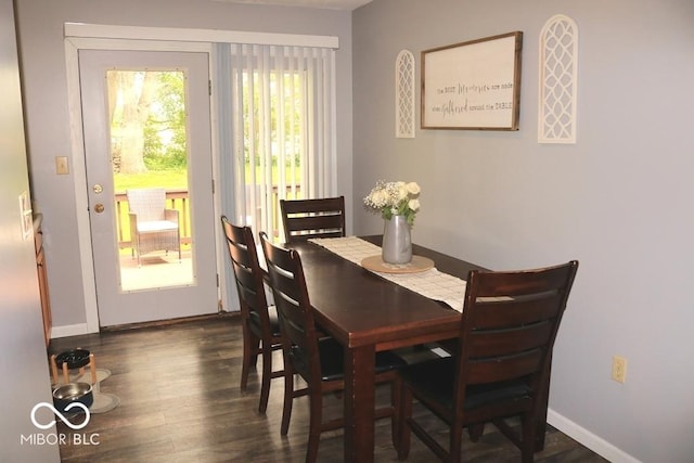 7 Gladiator Dr, Waynetown, IN 47990 - dining room featuring dark wood-style floors and baseboards