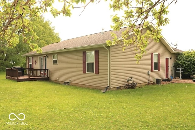 7 Gladiator Dr, Waynetown, IN 47990 - rear view of house with a deck, a lawn, central AC unit, and crawl space