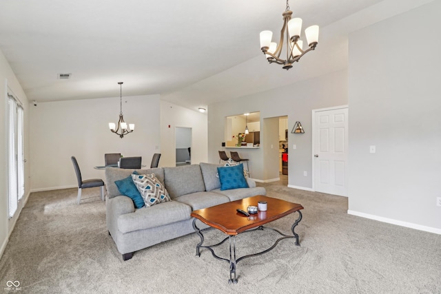 8910 Hunters Creek Dr Unit 207, Indianapolis, IN 46227 - living room with a chandelier, light carpet, lofted ceiling, and baseboards