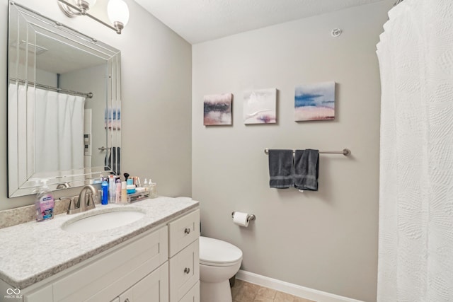 8910 Hunters Creek Dr Unit 207, Indianapolis, IN 46227 - full bathroom with toilet, baseboards, vanity, and a shower with curtain