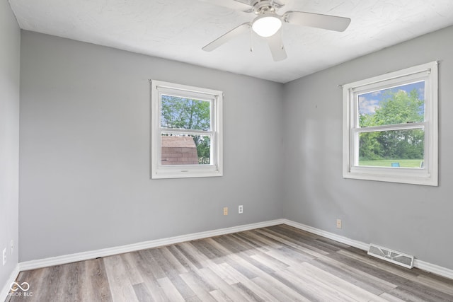 522 E County Road 1000 S, Clayton, IN 46118 - empty room with wood finished floors, baseboards, and ceiling fan