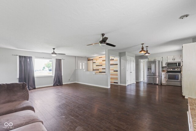 522 E County Road 1000 S, Clayton, IN 46118 - living room with ceiling fan, baseboards, and dark wood-style floors