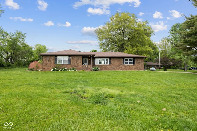 522 E County Road 1000 S, Clayton, IN 46118 - ranch-style home with a front lawn and brick siding
