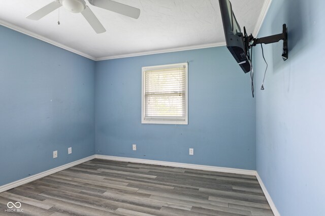 522 E County Road 1000 S, Clayton, IN 46118 - unfurnished room featuring crown molding, a ceiling fan, baseboards, and wood finished floors