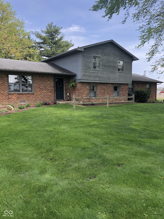 21749 Oak Ridge Rd, Sheridan, IN 46069 - view of front of home featuring a front lawn and brick siding