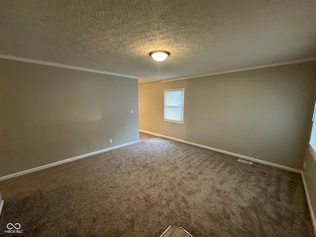 3742 N Wittfield St, Indianapolis, IN 46235 - unfurnished room with crown molding, baseboards, carpet floors, and a textured ceiling