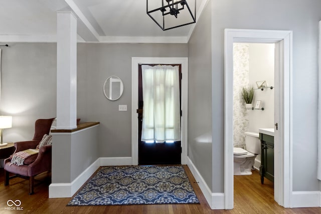 344 N Whittier Pl, Indianapolis, IN 46219 - foyer entrance with wood finished floors and baseboards