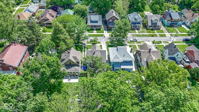 344 N Whittier Pl, Indianapolis, IN 46219 - aerial perspective of suburban area with a tree filled landscape