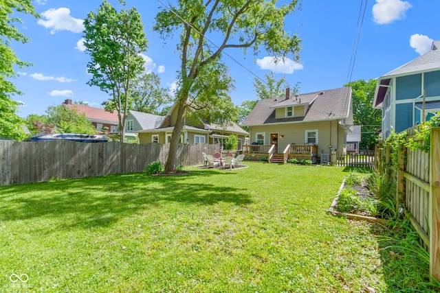 344 N Whittier Pl, Indianapolis, IN 46219 - view of yard with a wooden deck