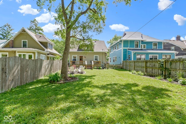 344 N Whittier Pl, Indianapolis, IN 46219 - view of yard with a wooden deck