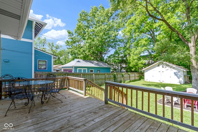 344 N Whittier Pl, Indianapolis, IN 46219 - wooden terrace with outdoor dining area
