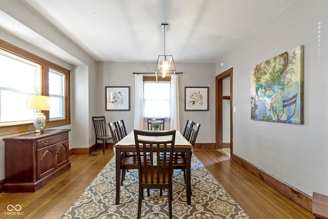 344 N Whittier Pl, Indianapolis, IN 46219 - dining area featuring wood finished floors and baseboards