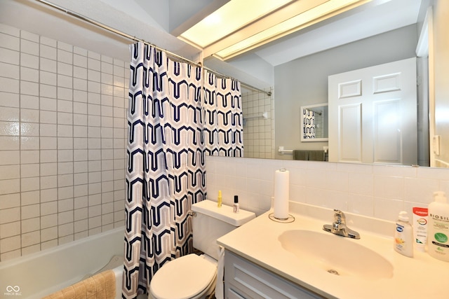 1310 Kings Cove Ct, Indianapolis, IN 46260 - bathroom with backsplash, toilet, shower / bath combination with curtain, vanity, and tile walls