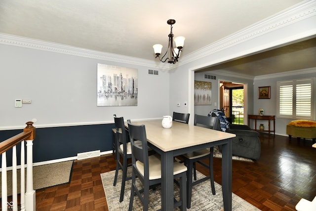 1310 Kings Cove Ct, Indianapolis, IN 46260 - dining room with a chandelier, ornamental molding, and baseboards