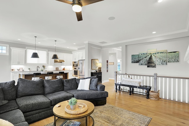 20010 Prescott Pl, Westfield, IN 46074 - living area featuring a ceiling fan, light wood-style floors, recessed lighting, and crown molding