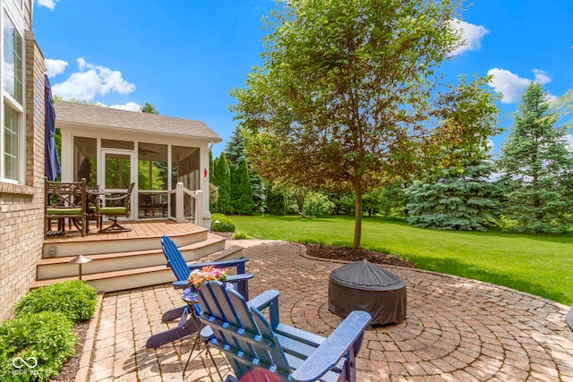 14094 Pecos Ct, Carmel, IN 46033 - view of patio / terrace with an outdoor fire pit, a sunroom, and a deck