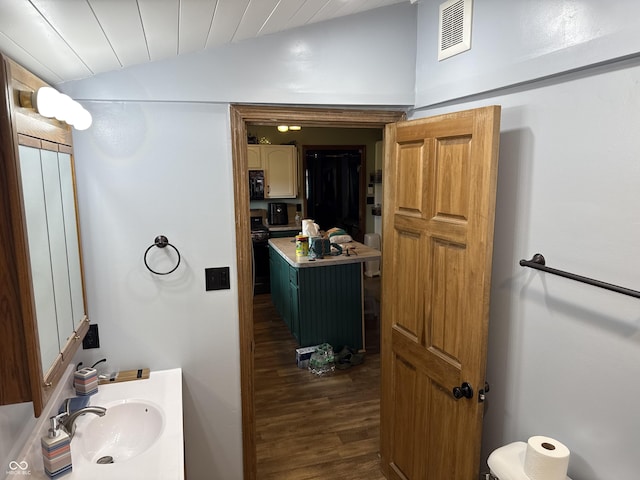 202 W Vine St, Bainbridge, IN 46105 - bathroom with vaulted ceiling, wood finished floors, vanity, and wooden ceiling