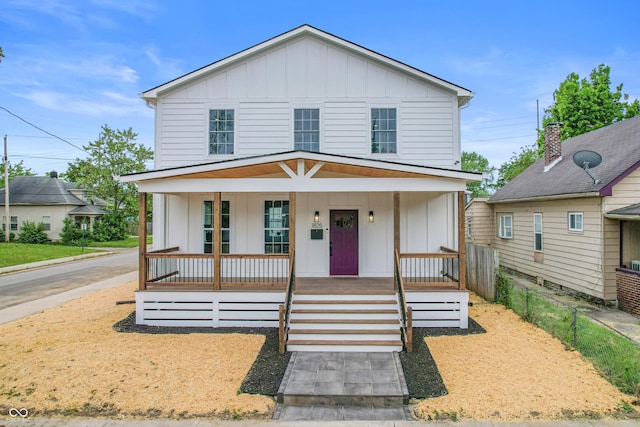 1825 E Maryland St, Indianapolis, IN 46201 - view of front of home featuring board and batten siding and covered porch
