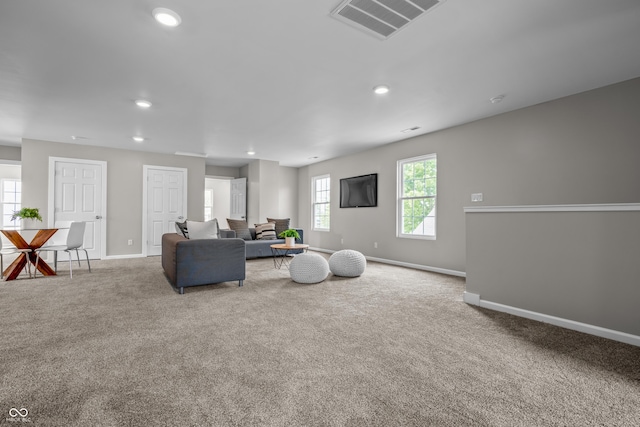 1825 E Maryland St, Indianapolis, IN 46201 - carpeted living area featuring baseboards and recessed lighting