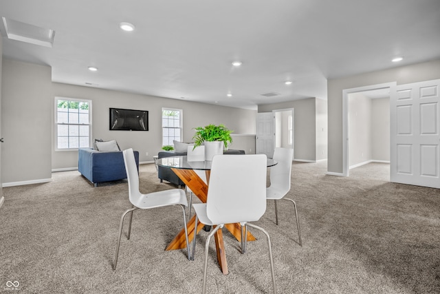 1825 E Maryland St, Indianapolis, IN 46201 - dining space featuring carpet, baseboards, and recessed lighting