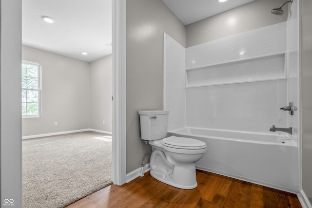 1825 E Maryland St, Indianapolis, IN 46201 - full bath with toilet, wood finished floors, shower / tub combination, and baseboards