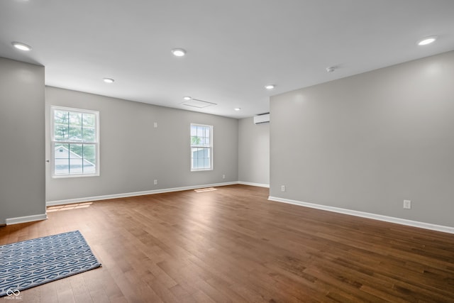 1825 E Maryland St, Indianapolis, IN 46201 - spare room featuring wood finished floors, baseboards, recessed lighting, and a smoke detector
