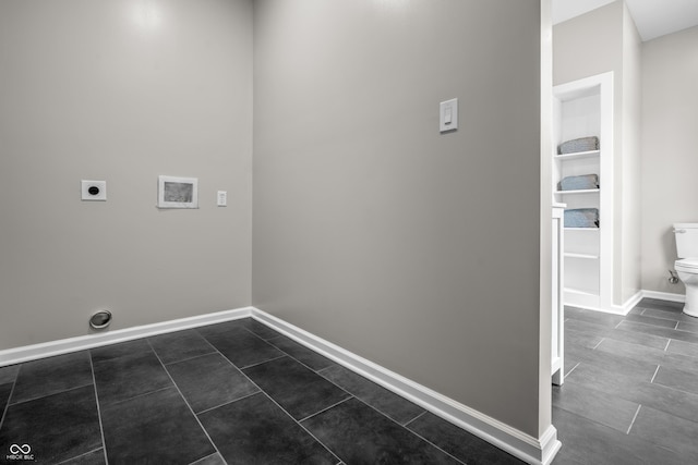1825 E Maryland St, Indianapolis, IN 46201 - washroom featuring electric dryer hookup, baseboards, and dark tile patterned flooring