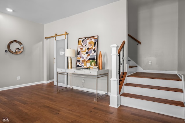 1825 E Maryland St, Indianapolis, IN 46201 - stairs featuring wood finished floors, baseboards, a barn door, and recessed lighting