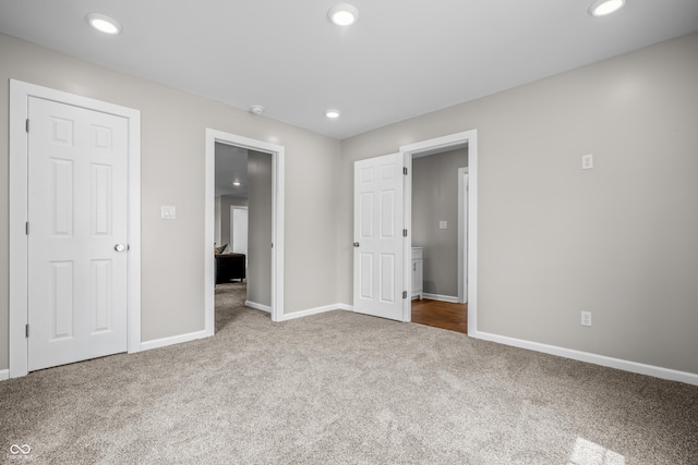 1825 E Maryland St, Indianapolis, IN 46201 - unfurnished bedroom with carpet, baseboards, and recessed lighting