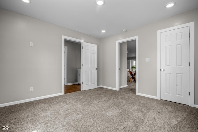1825 E Maryland St, Indianapolis, IN 46201 - unfurnished bedroom with carpet flooring, baseboards, and recessed lighting