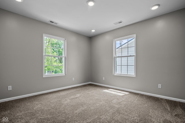 1825 E Maryland St, Indianapolis, IN 46201 - carpeted spare room featuring baseboards and recessed lighting
