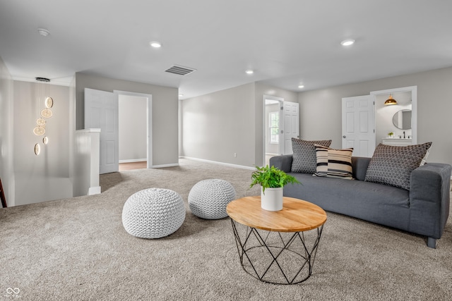 1825 E Maryland St, Indianapolis, IN 46201 - carpeted living room with recessed lighting and baseboards