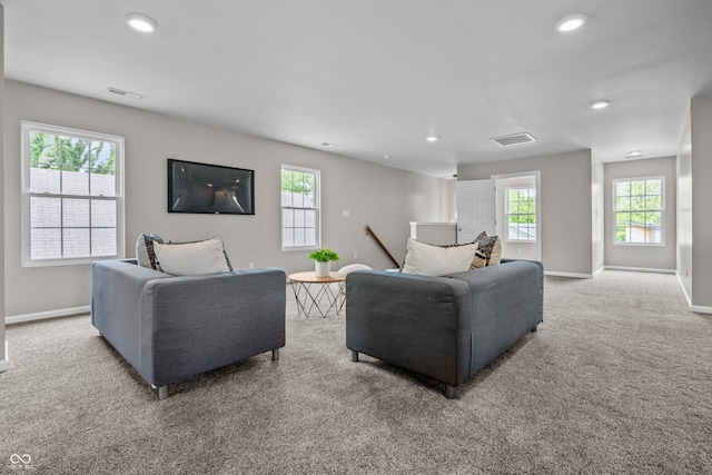 1825 E Maryland St, Indianapolis, IN 46201 - carpeted living room featuring baseboards and recessed lighting