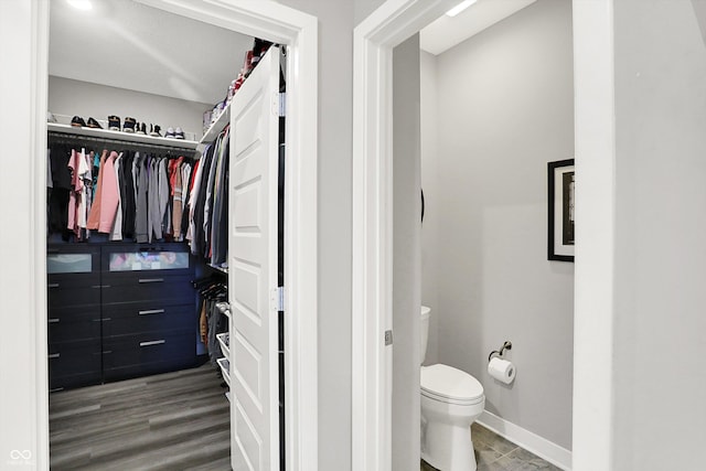 3592 Gillsland Rd, Bargersville, IN 46106 - bathroom with toilet, baseboards, and a walk in closet