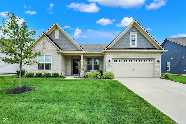 3592 Gillsland Rd, Bargersville, IN 46106 - craftsman house with driveway, a front lawn, brick siding, and a garage