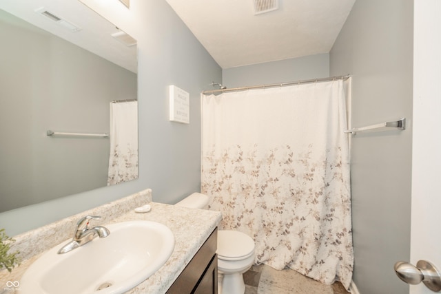 6579 Aster Dr, Pendleton, IN 46064 - full bathroom with toilet, vanity, and curtained shower