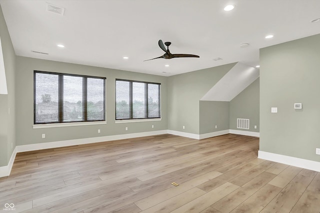 7116 Trail Ridge Ln, Indianapolis, IN 46259 - unfurnished living room with a ceiling fan, light wood-type flooring, and recessed lighting