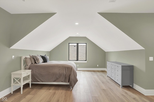7116 Trail Ridge Ln, Indianapolis, IN 46259 - bedroom featuring light wood-type flooring, lofted ceiling, and recessed lighting