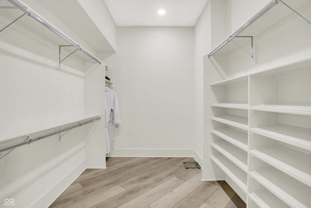 7116 Trail Ridge Ln, Indianapolis, IN 46259 - walk in closet with wood finished floors