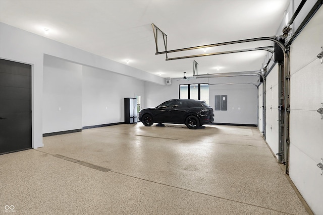 7116 Trail Ridge Ln, Indianapolis, IN 46259 - garage featuring electric panel and baseboards