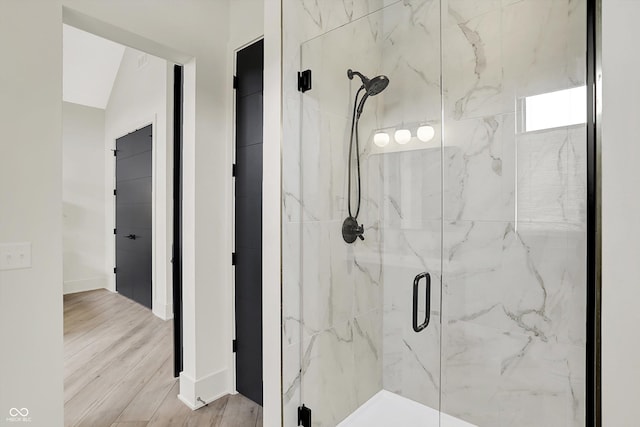 7116 Trail Ridge Ln, Indianapolis, IN 46259 - full bath with a marble finish shower and wood finished floors
