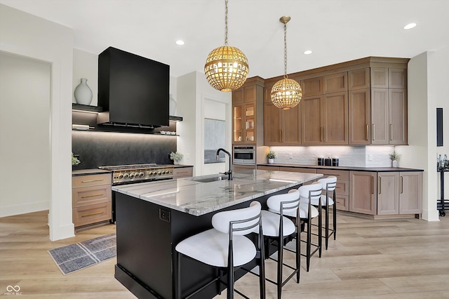 7116 Trail Ridge Ln, Indianapolis, IN 46259 - kitchen featuring range hood, appliances with stainless steel finishes, a chandelier, tasteful backsplash, and recessed lighting