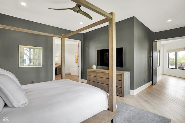 7116 Trail Ridge Ln, Indianapolis, IN 46259 - bedroom featuring light wood finished floors, recessed lighting, ensuite bath, and a ceiling fan