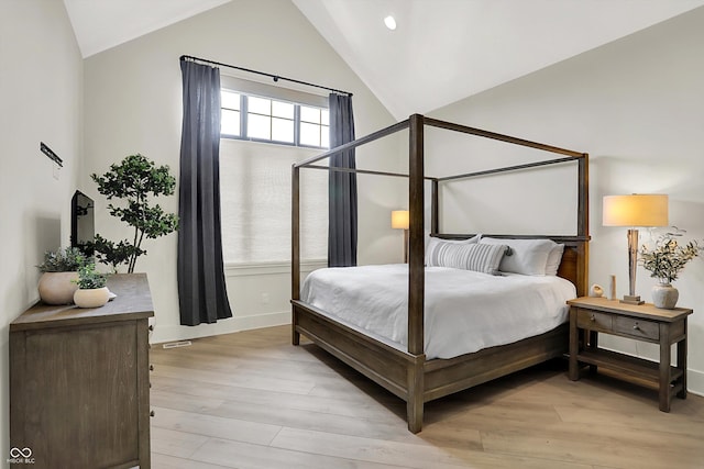 7116 Trail Ridge Ln, Indianapolis, IN 46259 - bedroom featuring lofted ceiling and light wood-style flooring