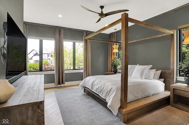 7116 Trail Ridge Ln, Indianapolis, IN 46259 - bedroom featuring recessed lighting, light wood-style flooring, and a ceiling fan