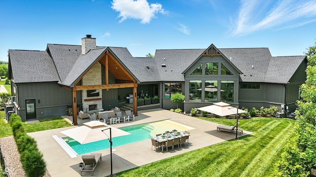 7116 Trail Ridge Ln, Indianapolis, IN 46259 - back of house with stone siding, a patio area, an outdoor living space with a fireplace, a chimney, and roof with shingles